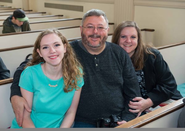 Parents and student at Honors Day Convocation during Family Weekend.